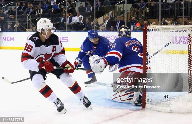 Jack Hughes of the New Jersey Devils scores a second period goal against Igor Shesterkin of the New York Rangers at Madison Square Garden on November...