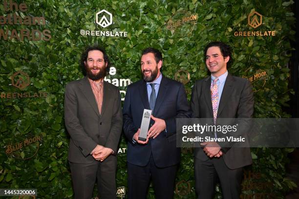 Josh Safdie, Adam Sandler and Benny Safdie pose in the GreenSlate Greenroom at The 2022 Gotham Awards at Cipriani Wall Street on November 28, 2022 in...