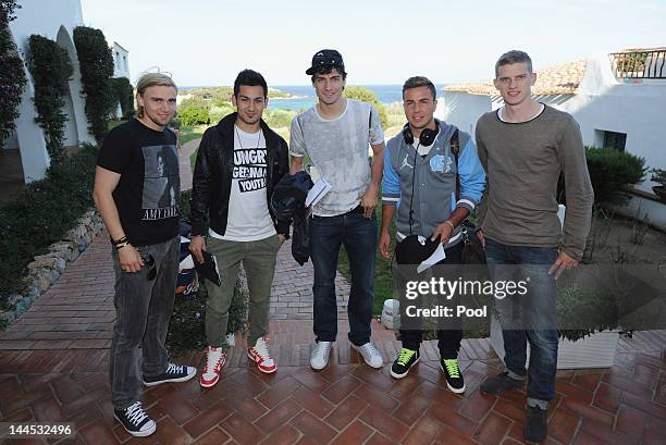 Marcel Schmelzer, Ilkay Guendogan, Mats Hummels, Mario Goetze and Sven Bender of Borussia Dortmund pose after their arrival at the team's hotel...