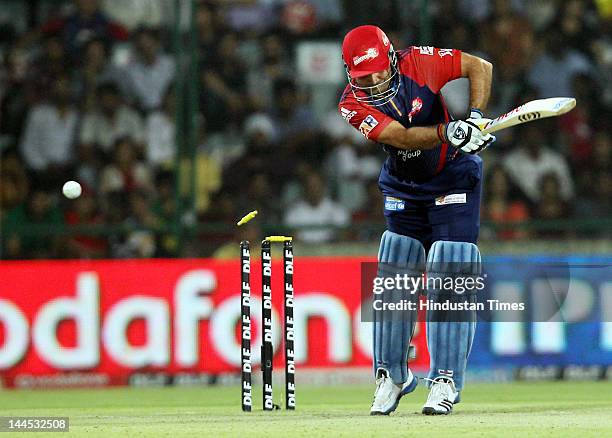 Delhi Daredevils Captain Virendra Sehwag is bold out by Kings XI Punjab bowler Parvinder Awana during the IPL cricket match between Delhi Daredevils...