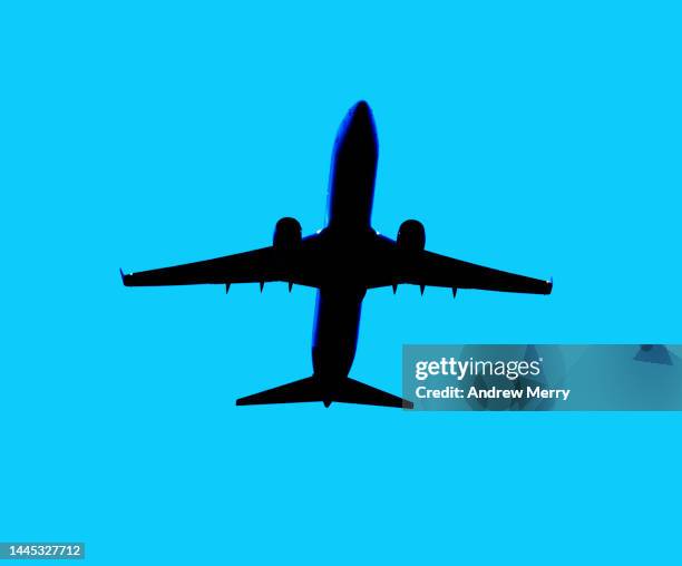 jet airplane flying, silhouette symbol blue sky - airplane illustration stock pictures, royalty-free photos & images