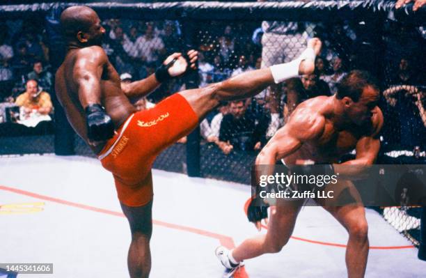 Maurice Smith battles Mark Coleman for the UFC heavyweight championship during the UFC 14 event inside Boutwell Auditorium on July 27, 1997 in...