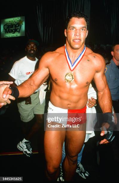 Mark Kerr reacts after winning the heavyweight tournament during the UFC 15 event at Hollywood Casino on October 17, 1997 in Bay St. Louis,...