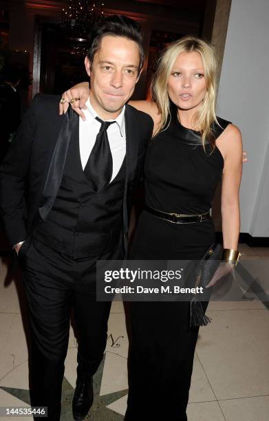 Jamie Hince and Kate Moss attend the Marie Curie Cancer Fundraiser hosted by Heather Kerzner at Claridge's Hotel on May 15, 2012 in London, England.