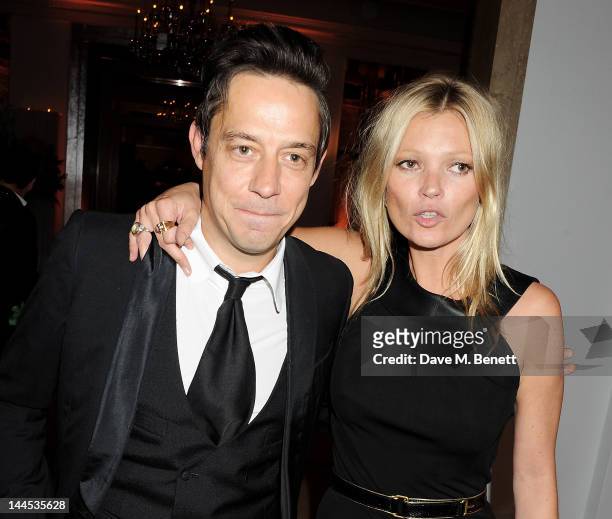 Jamie Hince and Kate Moss attend the Marie Curie Cancer Fundraiser hosted by Heather Kerzner at Claridge's Hotel on May 15, 2012 in London, England.