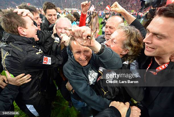 Head coach Norbert Meier of Duesseldorf celebrates after the Bundesliga Relegation second leg match between Fortuna Duesseldorf and Hertha BSC Berlin...