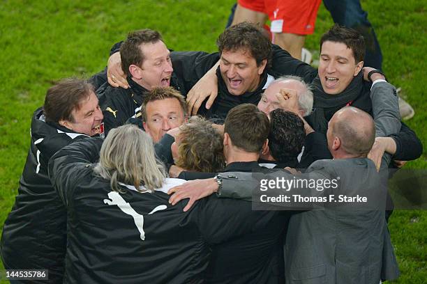 Head coach Norbert Meier celebrates after the Bundesliga Relegation match between Fortuna Duesseldorf and Hertha BSC Berlin at Esprit-Arena on May...