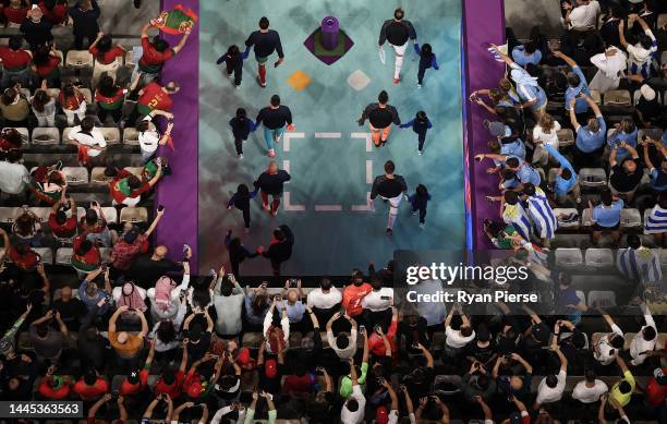 Cristiano Ronaldo of Portugal leads his team onto the pitch during the FIFA World Cup Qatar 2022 Group H match between Portugal and Uruguay at Lusail...