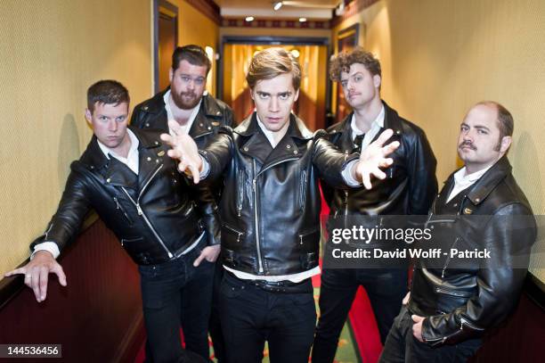 Howlin' Pelle Almqvist, Chris Dangerous, Nicholaus Arson, Vigilante Carlstroem and Dr Matt Destruction from The Hives are posing during photo session...