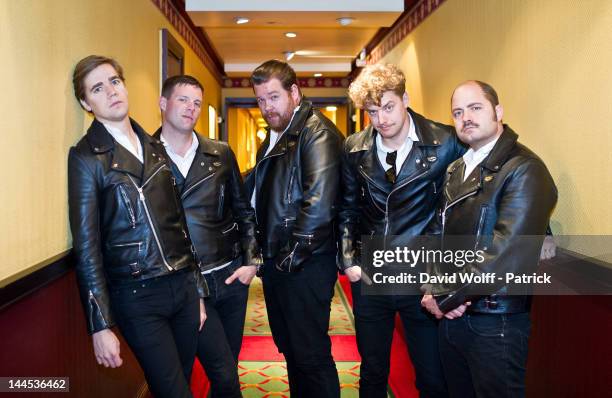 Howlin' Pelle Almqvist, Chris Dangerous, Nicholaus Arson, Vigilante Carlstroem and Dr Matt Destruction from The Hives are posing during photo session...