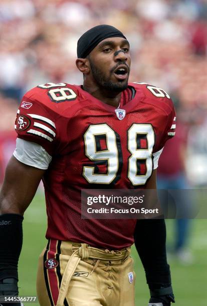 Julian Peterson of the San Francisco 49ers looks on against the Chicago Bears during an NFL football game on September 7, 2003 at Candlestick Park in...