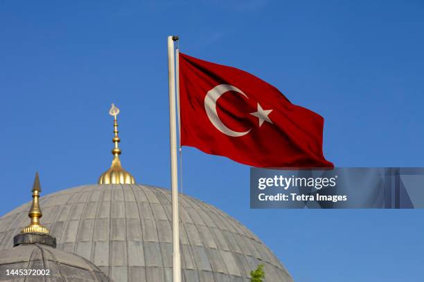 turkey, istanbul, hagia sophia and turkish flag - turkish flag imagens e fotografias de stock