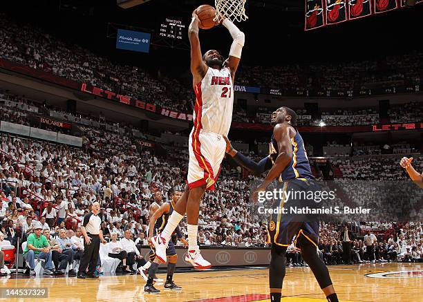 Ronny Turiaf of the Miami Heat goes to the basket against Roy Hibbert of the Indiana Pacers in Game Two of the Eastern Conference Semifinals during...