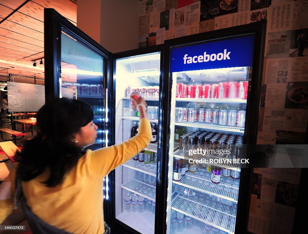 A Facebook employee grabs a beverage in 