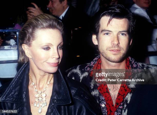 Irish actor Pierce Brosnan with his wife Cassandra Harris attend the opening night party at Stringfellow's on March 12, 1986 in New York City.