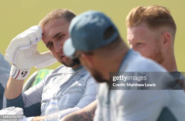 Liam Livingston of England talks to Ben Stokes of England and Brendon McCullum, Head Coach of England during a Nets Session ahead of the First Test...