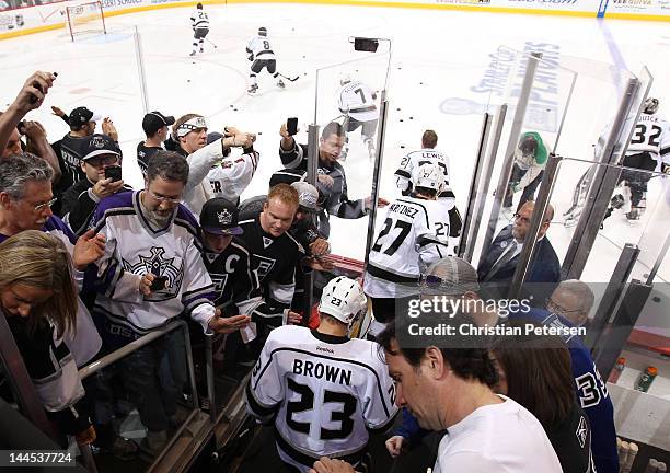 Dustin Brown of the Los Angeles Kings gets ready to take the ice for warm-up prior to Game Two of the Western Conference Final against the Phoenix...