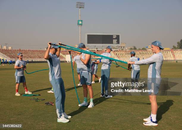 England players warm up during a Nets Session ahead of the First Test match at Rawalpindi Cricket Stadium on November 29, 2022 in Rawalpindi,...