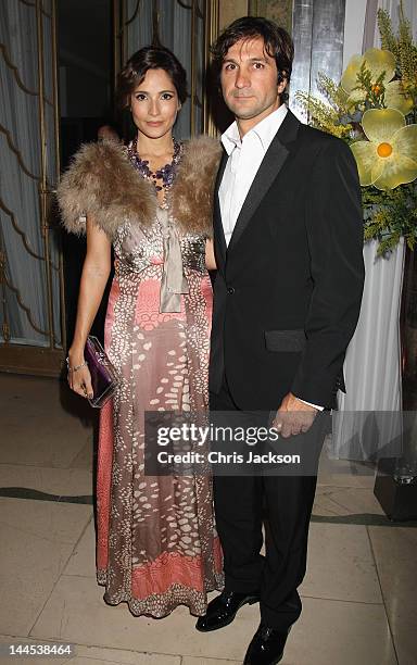 Astrid Munoz and Eduardo Novillo Astrada poses at the Marie Curie Cancer Care Fundraiser, hosted by Heather Kerzner at Claridge's Hotel on May 15,...