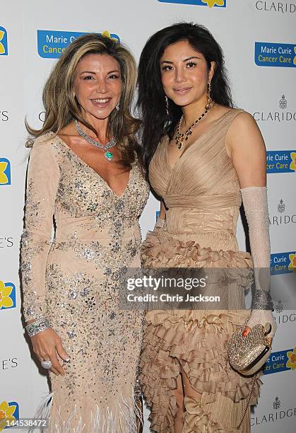 Elaine Chang and Lisa Tchenguiz pose at the Marie Curie Cancer Care Fundraiser, hosted by Heather Kerzner at Claridge's Hotel on May 15, 2012 in...