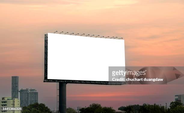 blank billboard for outdoor advertising poster on the highway - valla límite fotografías e imágenes de stock