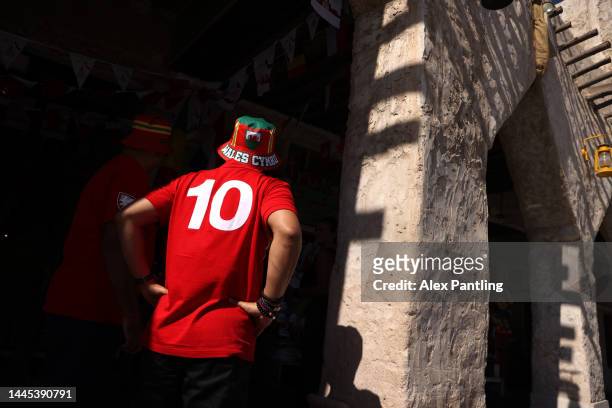 Wales fan walks through the souq during the FIFA World Cup Qatar 2022 at Souq Waqif on November 29, 2022 in Doha, Qatar.