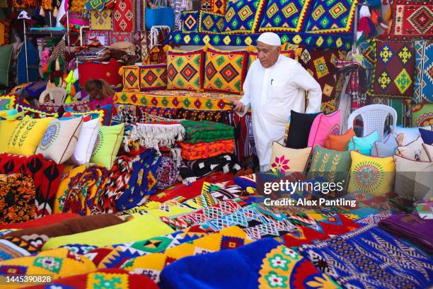 Man at work in the souq during the FIFA World Cup Qatar 2022 at Souq Waqif on November 29, 2022 in Doha, Qatar.