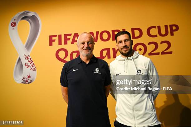 Graham Arnold, Head Coach of Australia, and Mathew Leckie of Australia pose for a photo during the Australia Press Conference at the main Media...