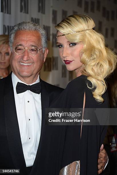 President and CEO Del Bryant with singer Kesha arrive at the 60th annual BMI Pop Awards at the Beverly Wilshire Four Seasons Hotel on May 15, 2012 in...