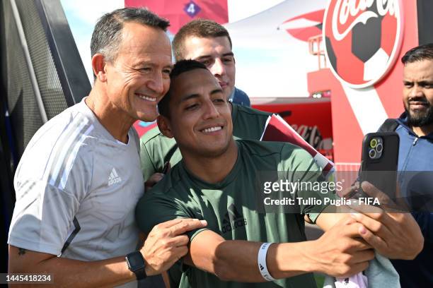 Legend Luis Hernandez pose for a selfie with a Fan World Cup Participant during the FIFA World Cup 2022 Qatar Fan Festival at Al Bidda Park on...