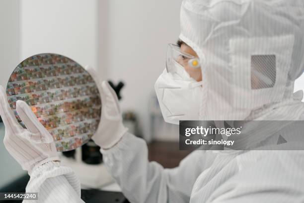 engineers are checking wafer chips in laboratory - electron stock pictures, royalty-free photos & images
