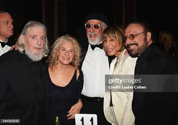 Songwriters Gerry Goffin, Carole King, Jeff Barry, Cynthia Weil, and Barry Mann pose during the 60th annual BMI Pop Awards at the Beverly Wilshire...