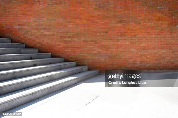 red brick walls and concrete stairs - 上海 stock pictures, royalty-free photos & images