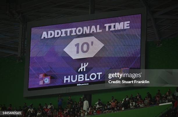 Extra time of 10 minutes is displayed on the scoreboard during the FIFA World Cup Qatar 2022 Group H match between Korea Republic and Ghana at...