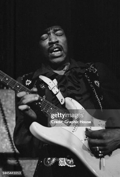 American singer, songwriter and guitarist Jimi Hendrix , playing a Fender Stratocaster guitar, while performing live onstage