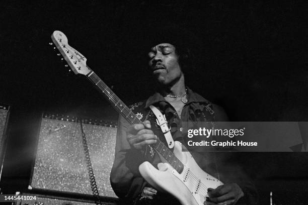 American singer, songwriter and guitarist Jimi Hendrix , playing a Fender Stratocaster guitar, while performing live onstage