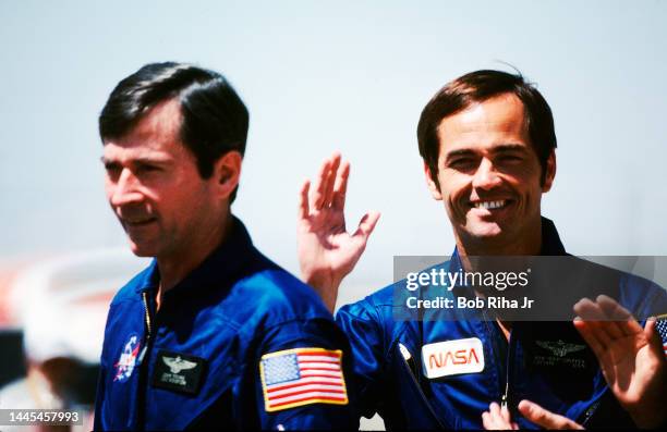 Space Shuttle Mission STS-1 Pilot Robert Crippen and Commander John Young are greeted by family members and guests after landing Space Shuttle...