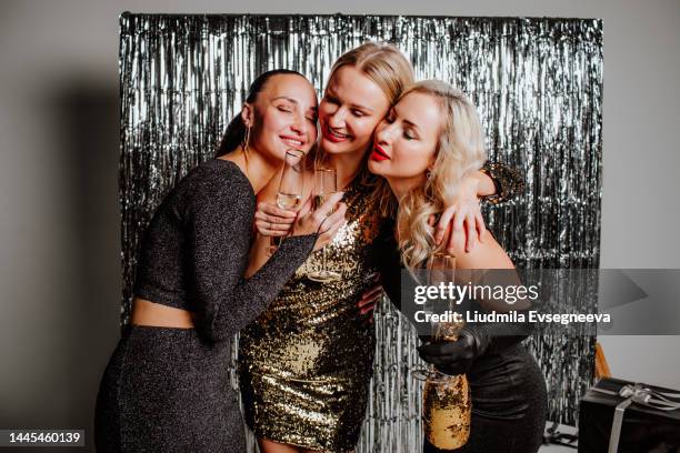 girls are at  disco new year's celebration party - girl white dress stock pictures, royalty-free photos & images