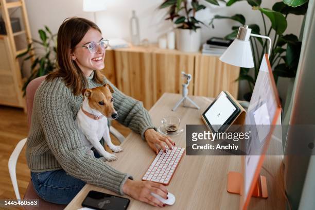 young woman online shopping at home - generation z workforce stock pictures, royalty-free photos & images