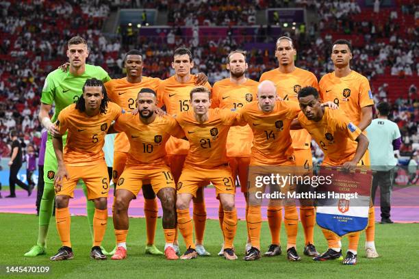 NNetherlands players line up for the team photo prior to the FIFA World Cup Qatar 2022 Group A match between Netherlands and Qatar at Al Bayt Stadium...