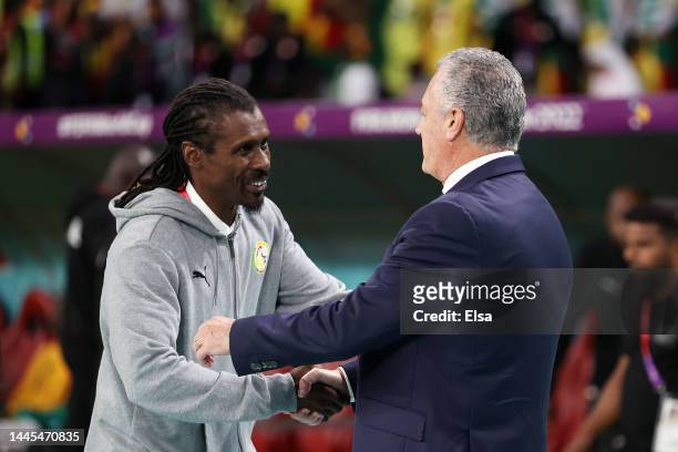Gustavo Alfaro, Head Coach of Ecuador, shakes hands with Aliou Cisse, Head Coach of Senegal, prior to the FIFA World Cup Qatar 2022 Group A match...
