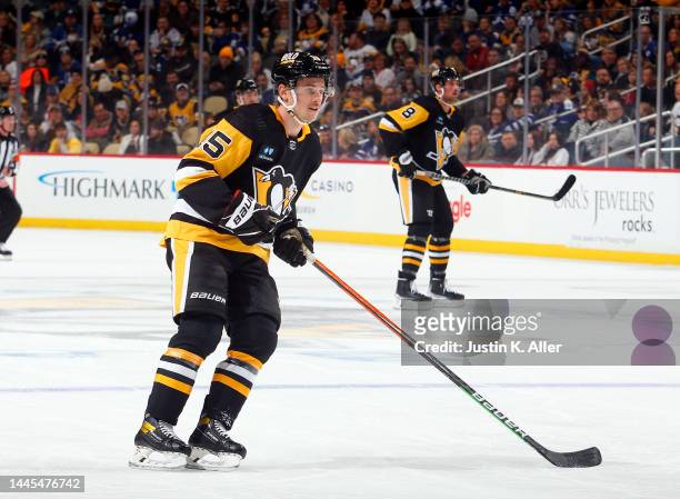 Josh Archibald of the Pittsburgh Penguins in action against the Toronto Maple Leafs during the game at PPG PAINTS Arena on November 26, 2022 in...