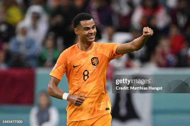 Cody Gakpo of Netherlands celebrates after scoring their team’s first goal during the FIFA World Cup Qatar 2022 Group A match between Netherlands and...