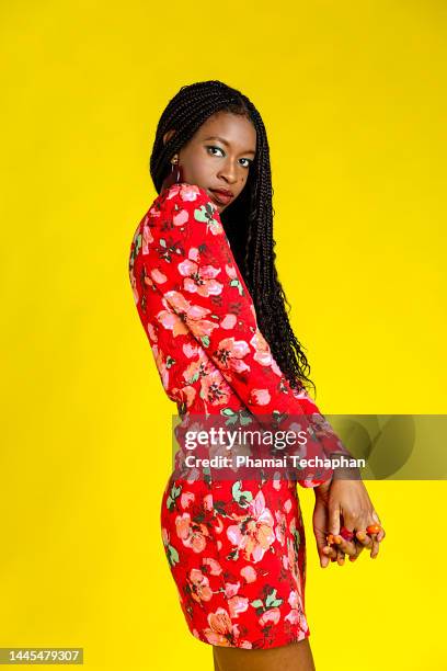 beautiful woman wearing red floral pattern dress - sudbury stock pictures, royalty-free photos & images