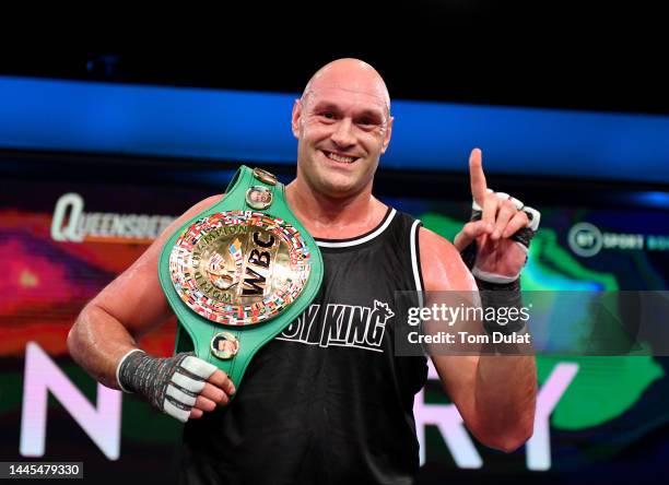 Tyson Fury poses for photographs during the media work out ahead of Tyson Fury v Derek Chisora at BT Studios on November 29, 2022 in Stratford,...