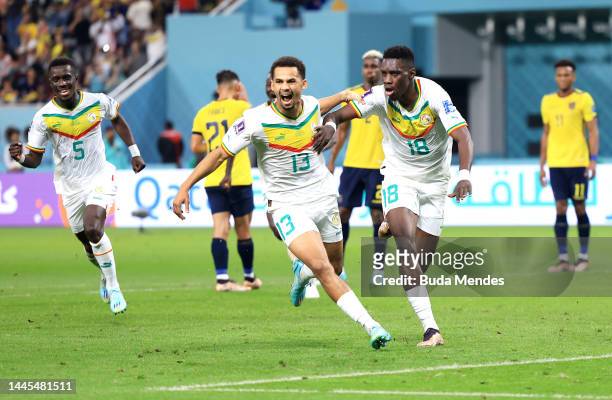 Ismaila Sarr of Senegal celebrates with teammates after scoring their team’s first goal off a penalty during the FIFA World Cup Qatar 2022 Group A...