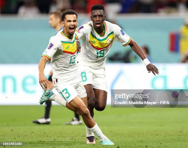 Ismaila Sarr of Senegal celebrates with Iliman Ndiaye after scoring their team’s first goal off a penalty during the FIFA World Cup Qatar 2022 Group...