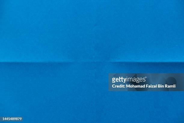 folded blue paper for background