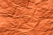 orange crumpled paper for background