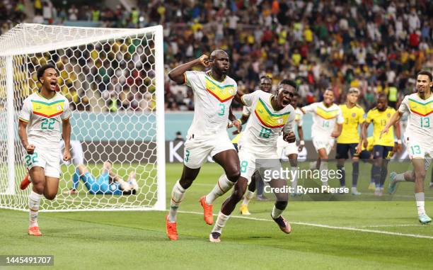 Kalidou Koulibaly of Senegal celebrates scoring his side's second goal during the FIFA World Cup Qatar 2022 Group A match between Ecuador and Senegal...